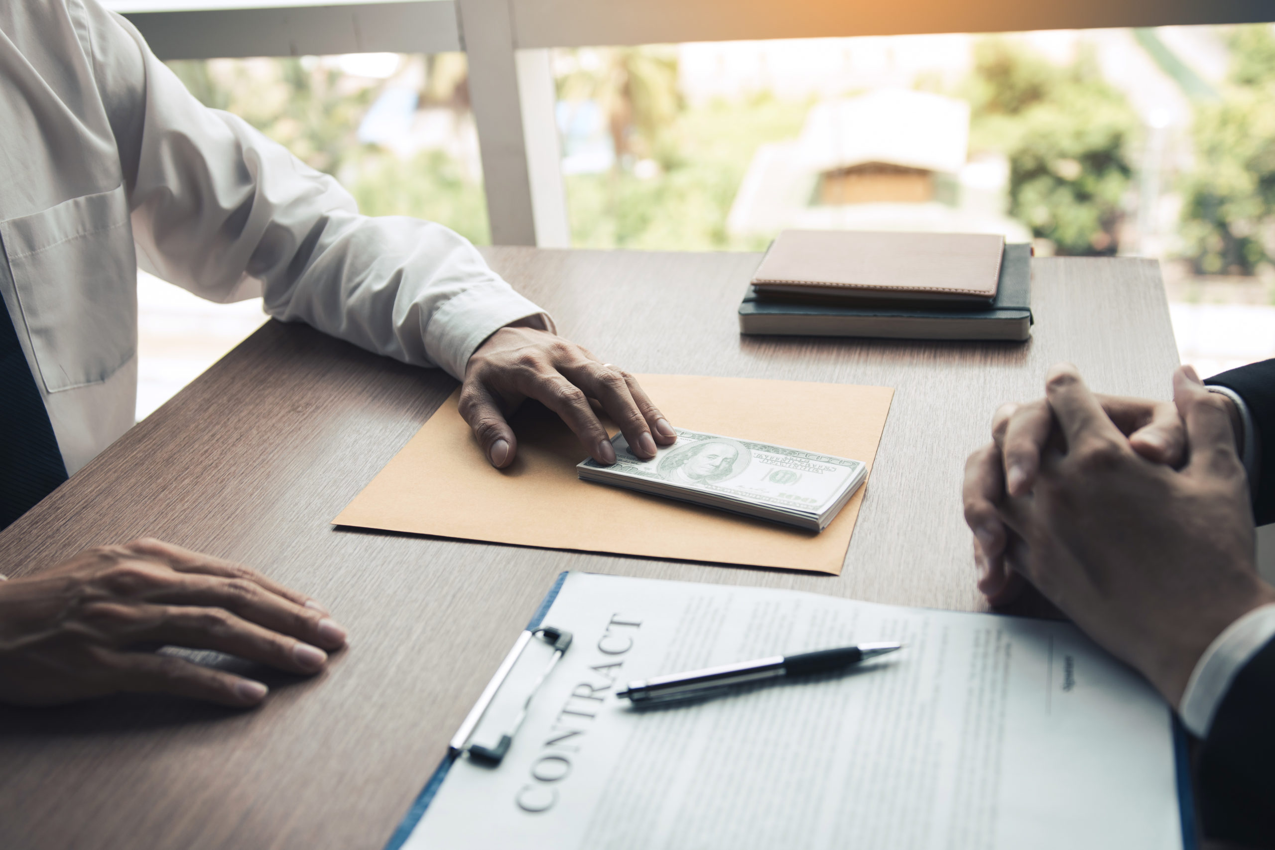 negociación con dinero de por medio